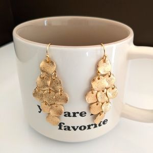 Round shape dangling drop earrings.